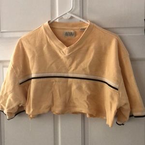 Crop yellow polo